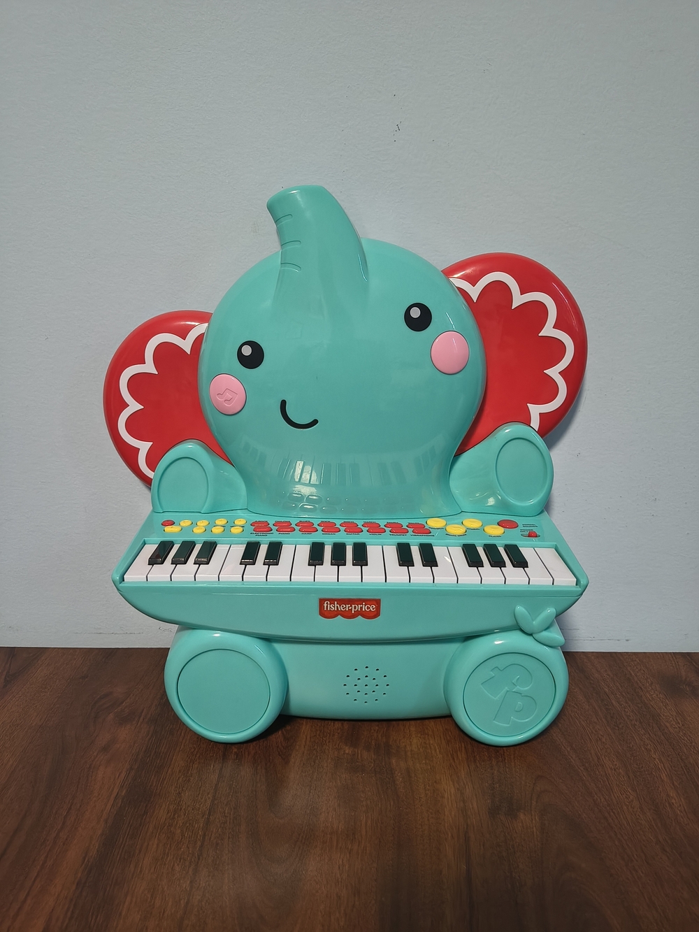 Fisher-Price Teal Elephant Piano Toy for Kids